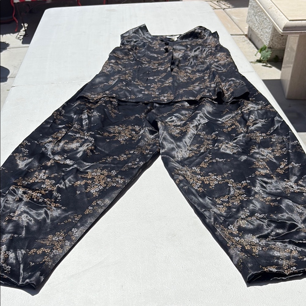 Chic Black and Gold Jumpsuit with Modern Design